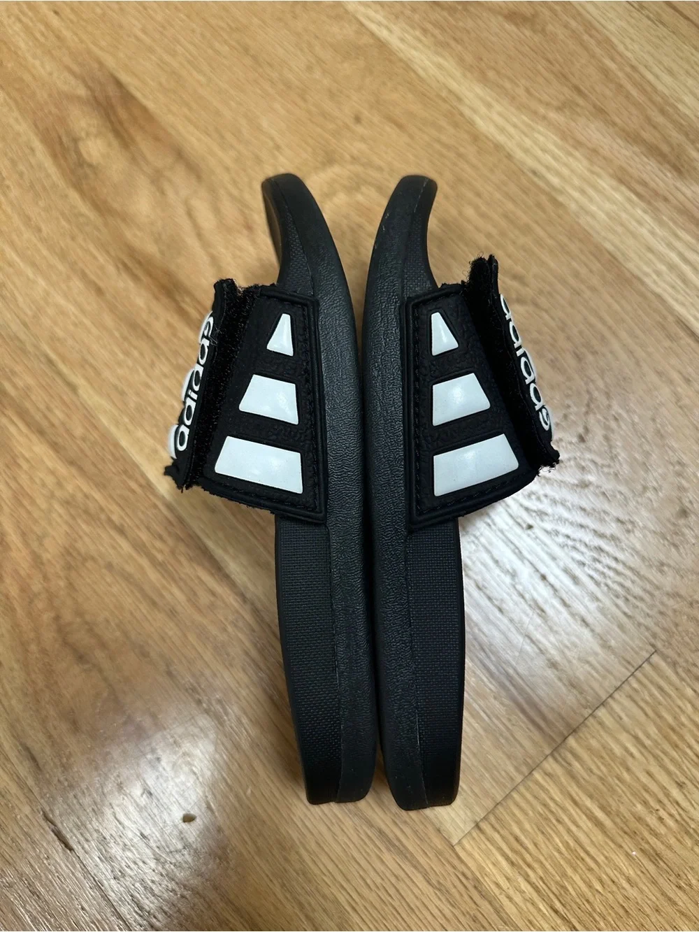 adidas Kids Black and White Slide Sandals with Three Stripes